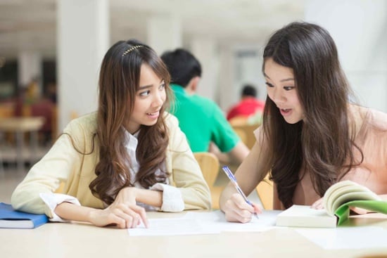 students discussing their lesson